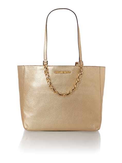 michael kors gold chain clutch|michael kors large gold tote.